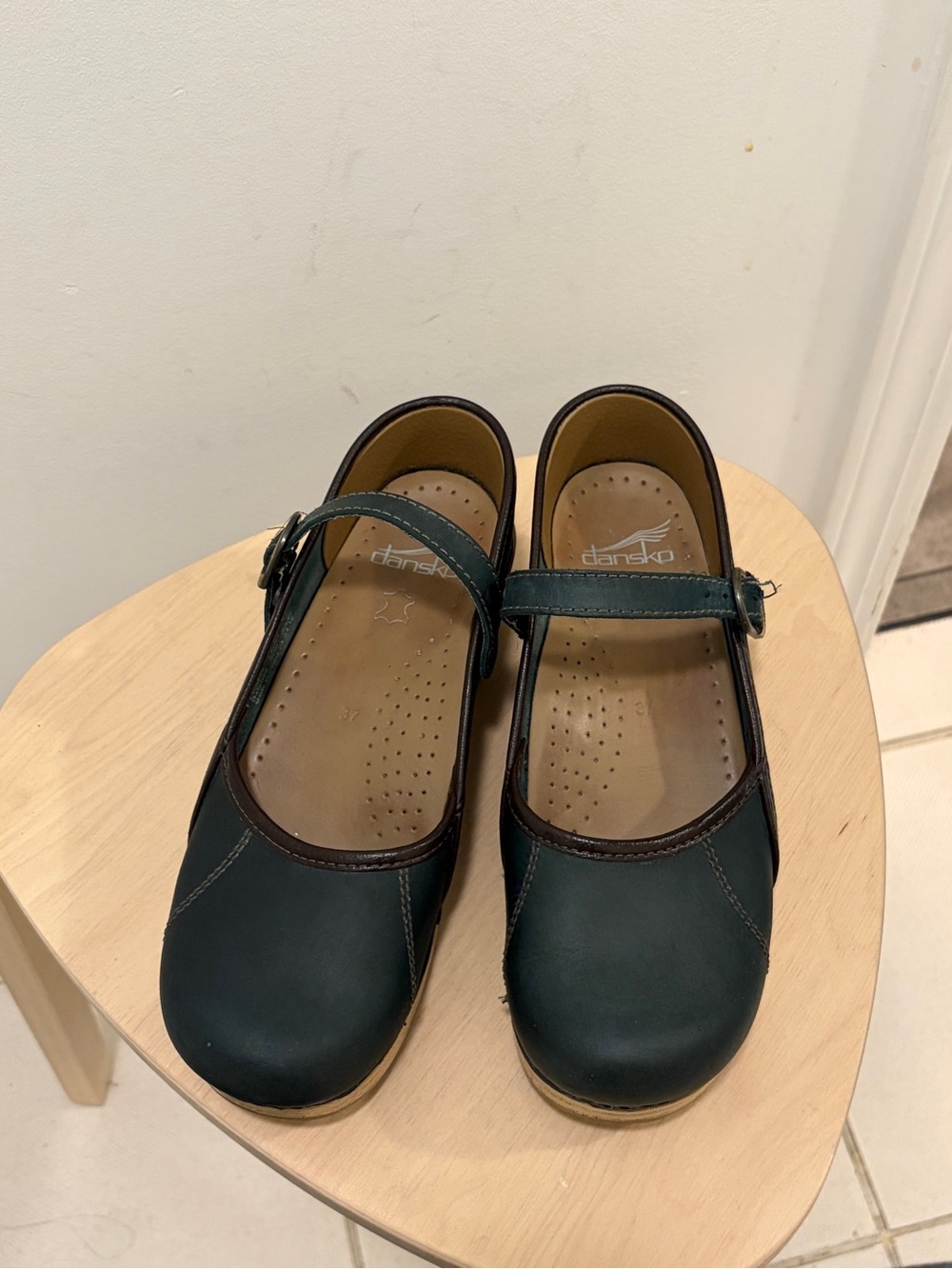 Dansko Marcelle Mary Jane Clogs in Forest Green with Brown Trim. Size 37